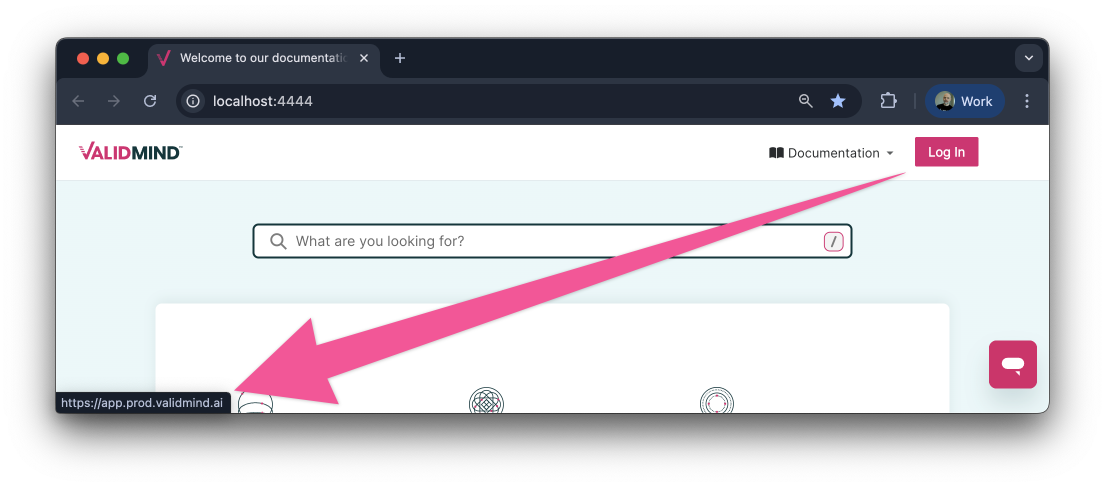 A web browser window displaying a webpage with a header containing the ValidMind logo on the left and a Log In button on the right in a pink color. The header also includes a Documentation link next to the Log In button. Below the header, there is a large search bar with placeholder text asking What are you looking for? centered on a light blue background. In the bottom right corner, there is a small chat icon in pink.